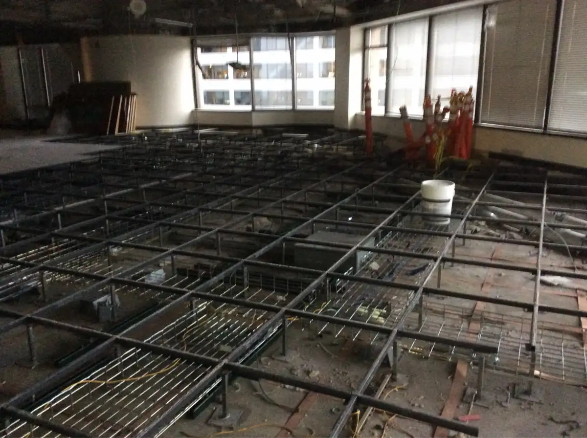 Pedestal floor demo ready for haul-off and clean-up