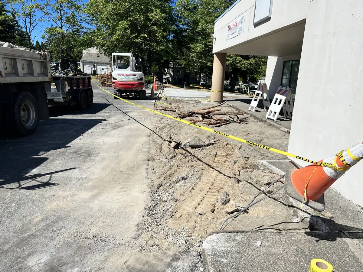 Saw-cut and removal of an existing commercial sidewalk