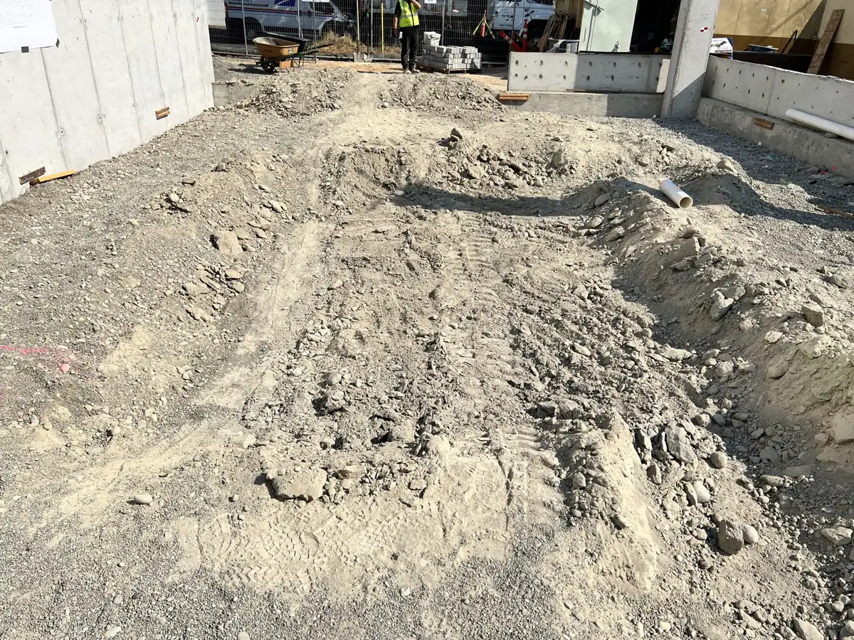 Site grading and rough excavation before backfill