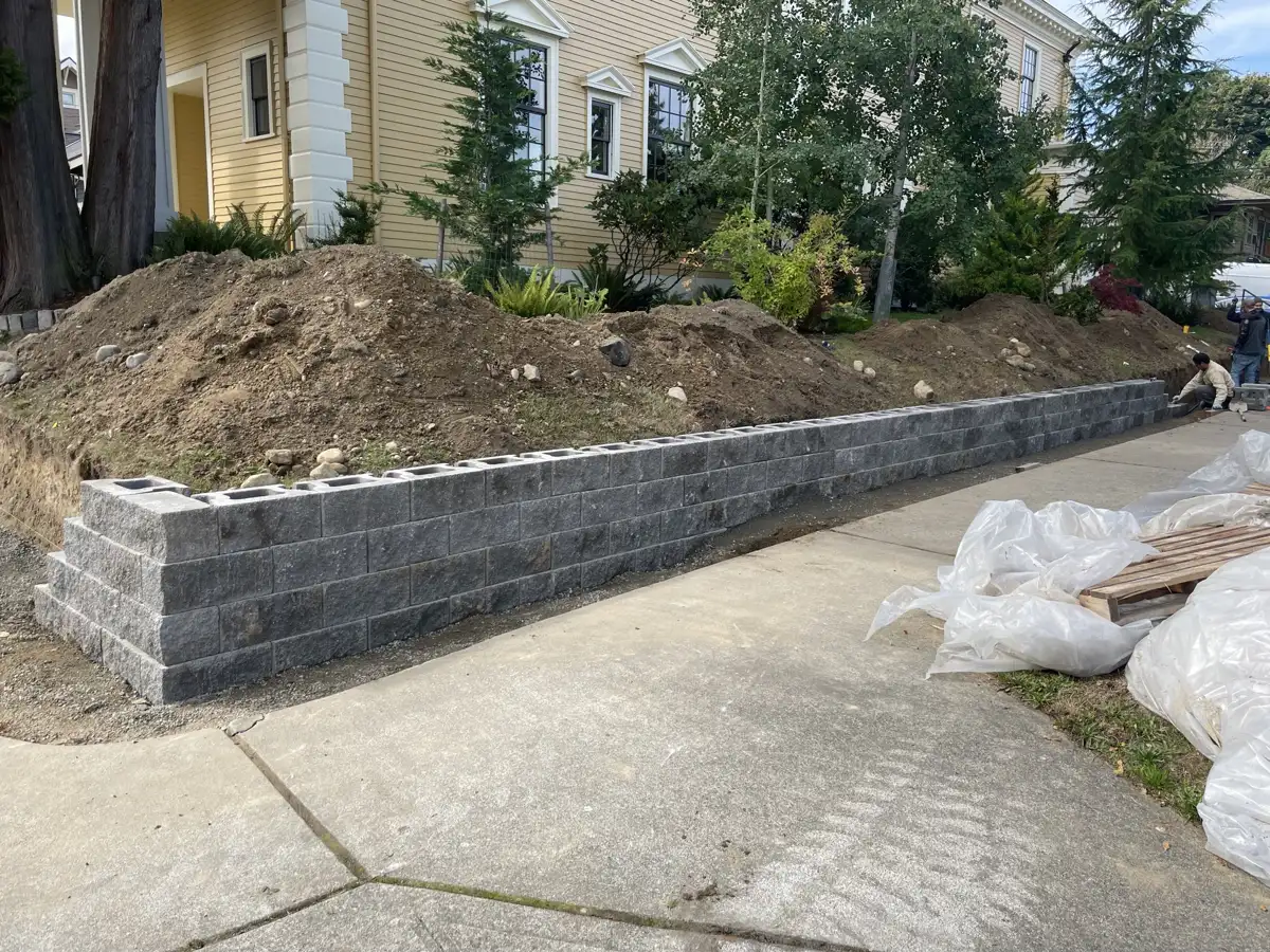 Block wall rising along the corner lot