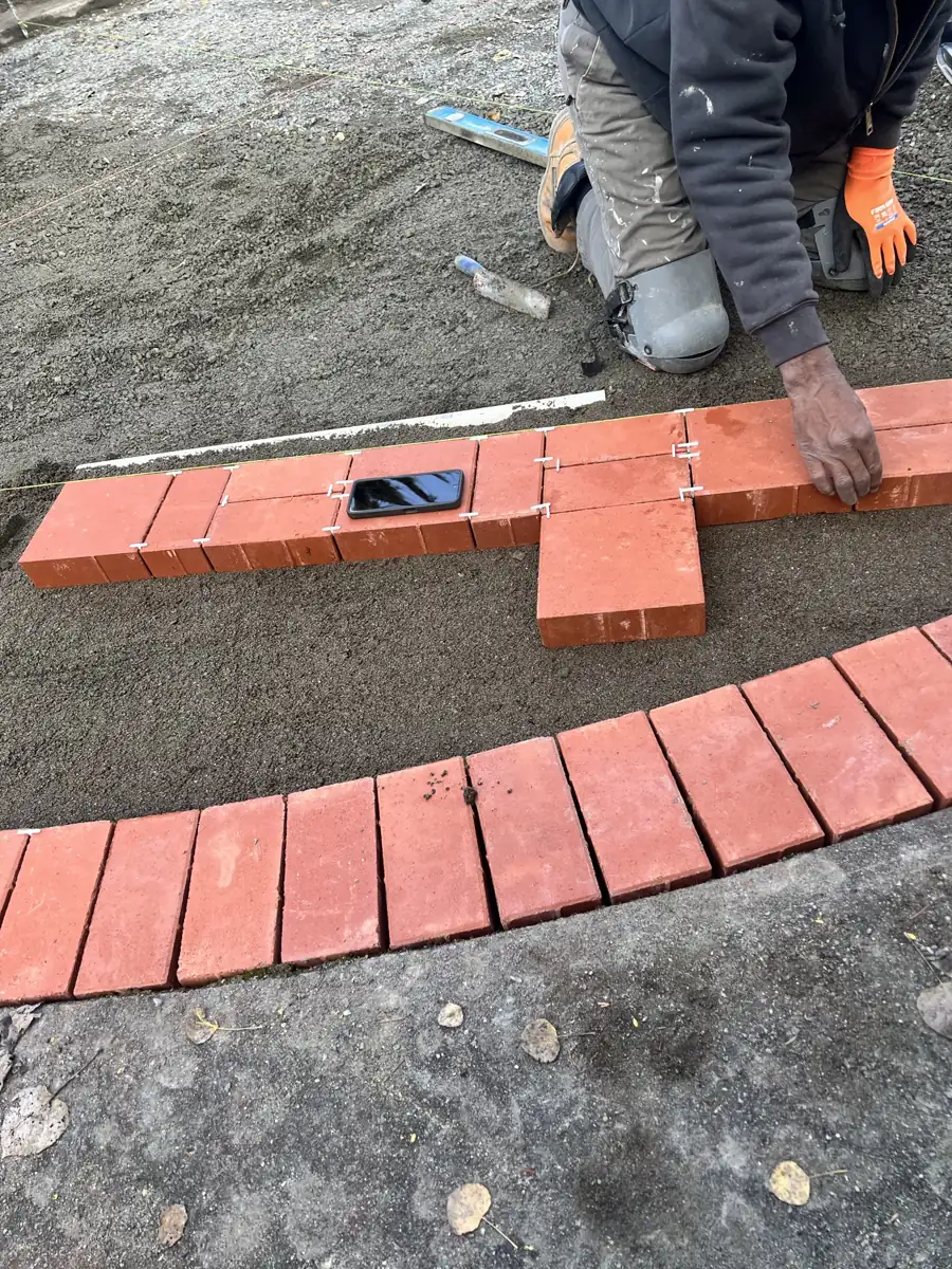 Cutting and fitting engraved pavers by hand