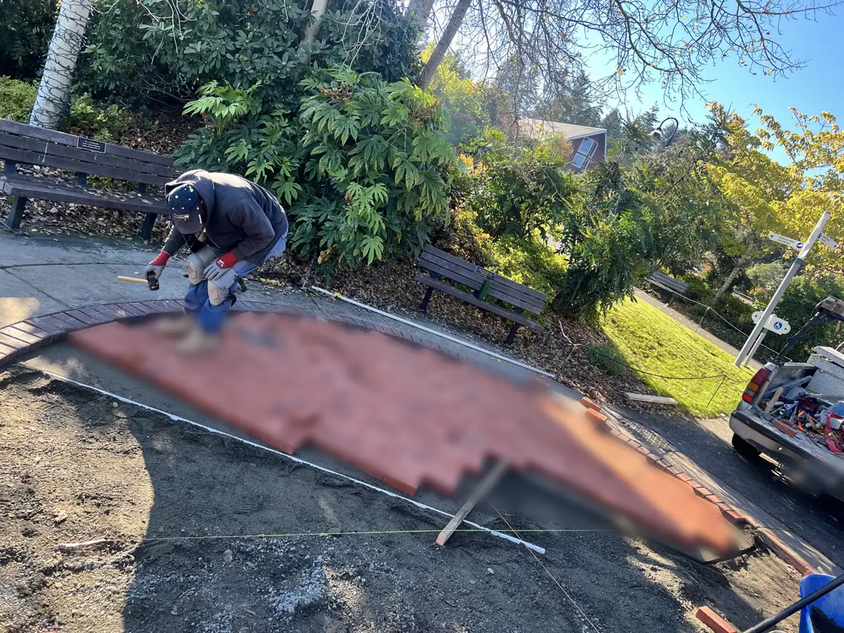 Setting memorial pavers to a curved layout (engravings blurred)