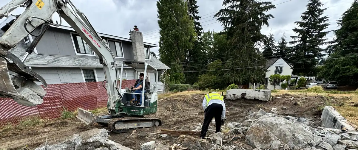 HULK excavator and crew on a residential demolition