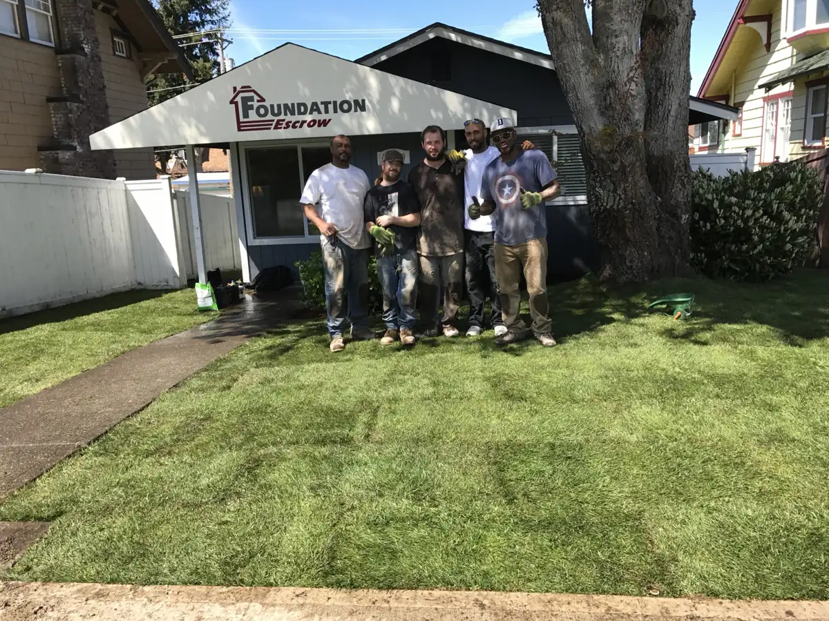 The HULK Construction crew together on a finished residential job
