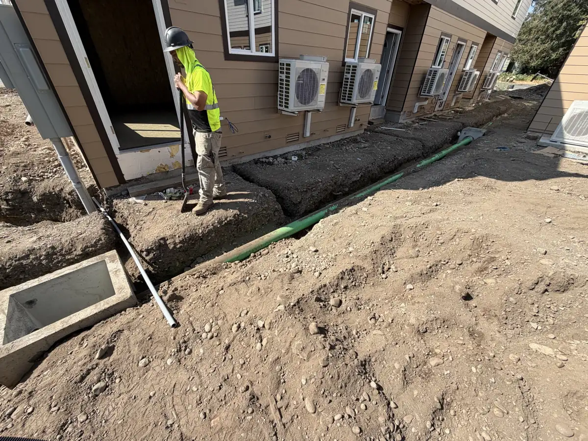 Prospect Townhomes: individual heat pumps and drainage along the five-plex