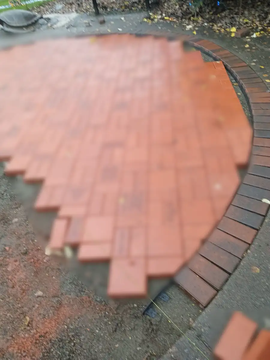 Memorial paver field (engravings blurred for privacy)